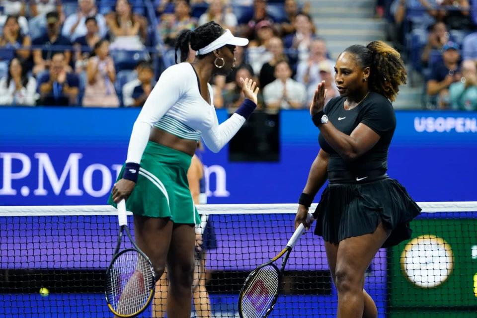 Serena (right) and Venus Williams were beaten on their doubles comeback (Frank Franklin II/AP) (AP)