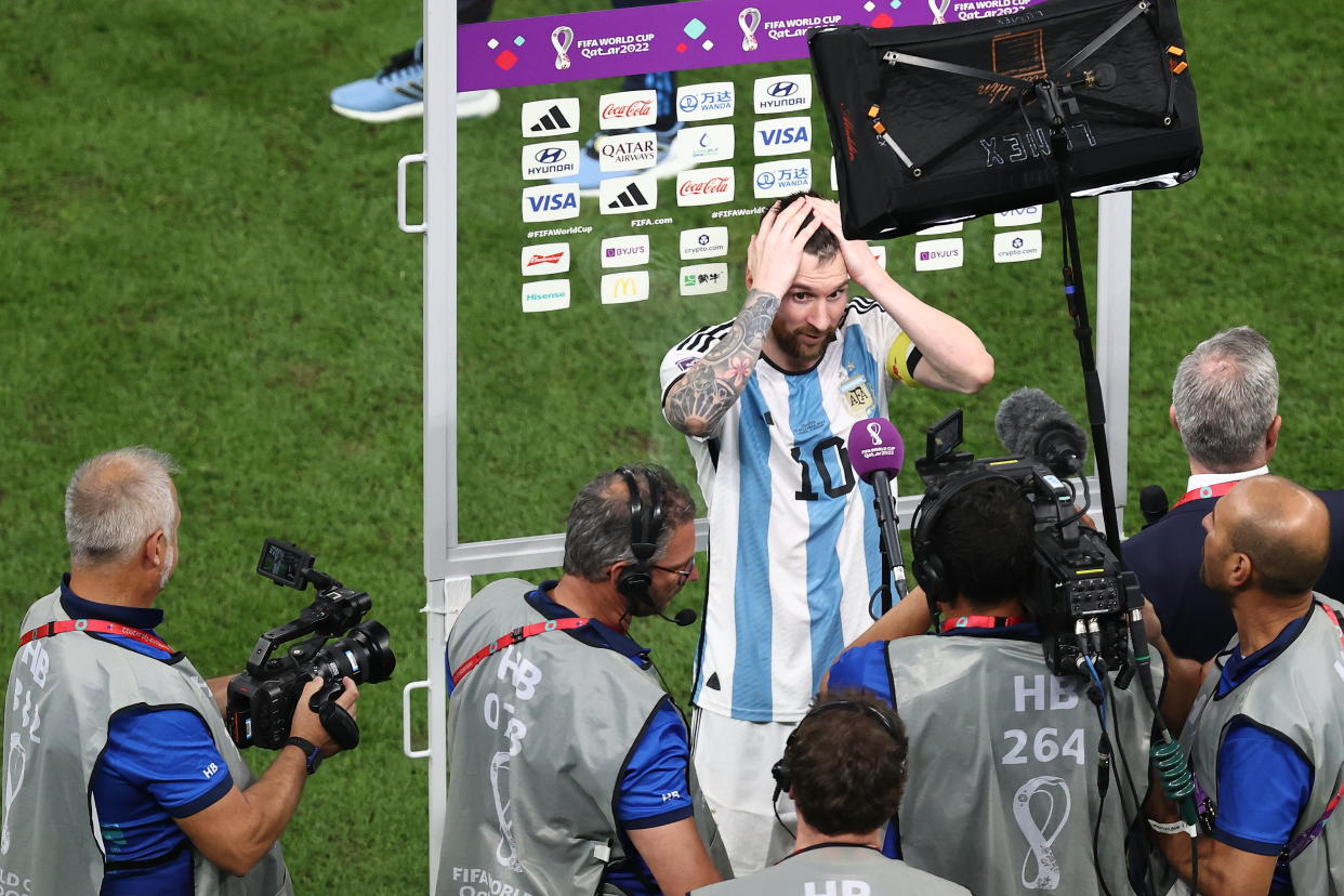 LUSAIL CITY, QATAR - DECEMBER 13: Lionel Messi of Argentina being interviewed at full time after Argentina qualify for the FIFA World Cup final after the FIFA World Cup Qatar 2022 semi final match between Argentina and Croatia at Lusail Stadium on December 13, 2022 in Lusail City, Qatar. (Photo by James Williamson - AMA/Getty Images)