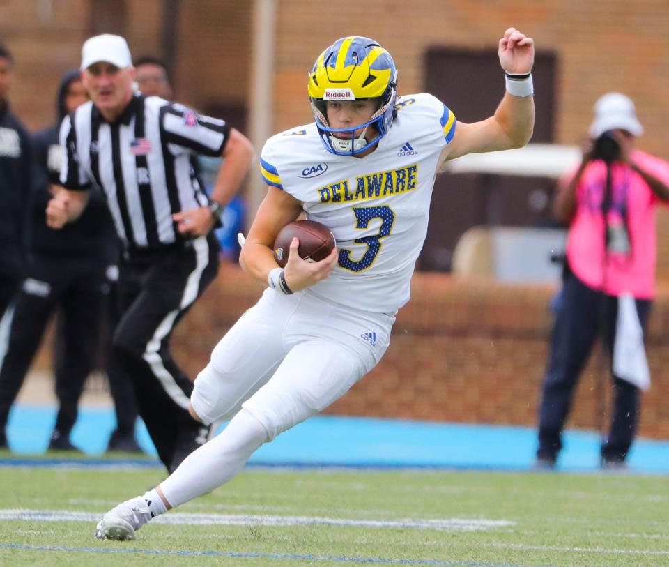 Delaware quarterback Zach Marker carries in the first quarter against Hampton at Armstrong Stadium in Hampton, Va., Saturday, Oct. 21, 2023.