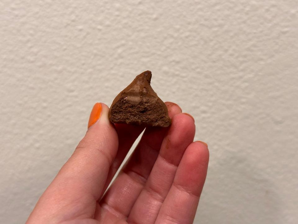 The writer holds a Trader Joe's minty truffle