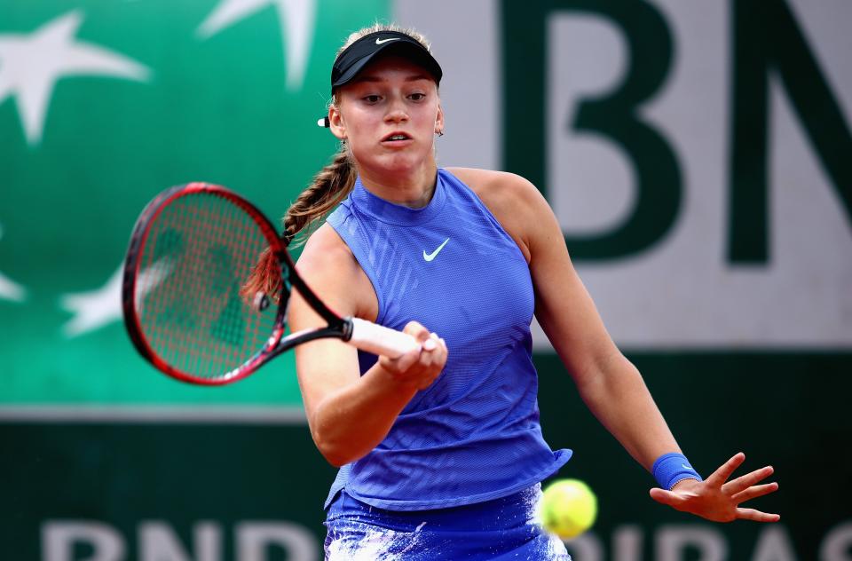 Elena Rybakina of Russia plays a forehand during girls singles semi-final match against Whitney Osuigwe of The United States on day thirteen of the 2017 French Open at Roland Garros