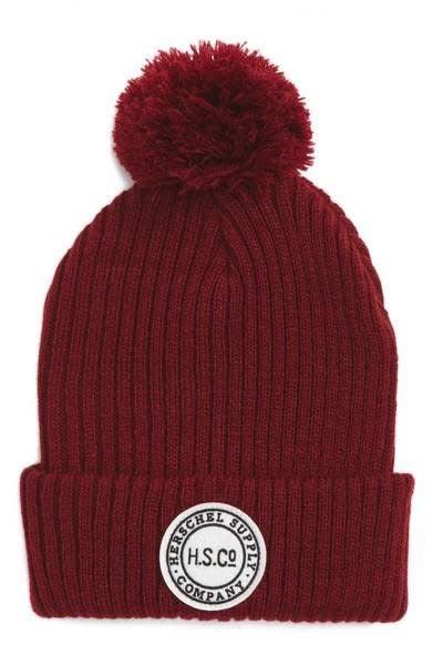 Beanies for natural hair don't have to be boring. Add some winter chic to your look with this <a href="https://shop.nordstrom.com/s/herschel-supply-co-sepp-knit-beanie/4536277?origin=coordinating-4536277-0-4-PDP_1-recbot-also_viewed2&amp;recs_placement=PDP_1&amp;recs_strategy=also_viewed2&amp;recs_source=recbot&amp;recs_page_type=product" target="_blank">pompom beanie</a> that's got a great amount of stretch to fit over your curls.