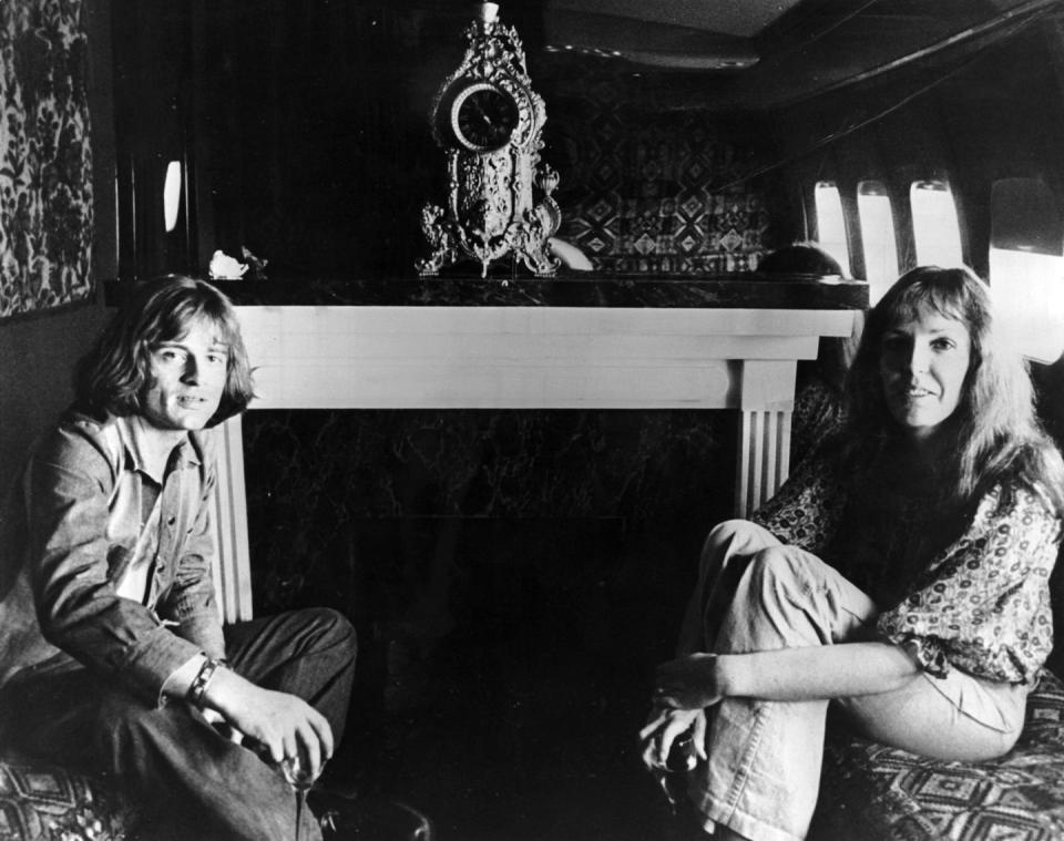 <p>Led Zeppelin's John Paul Jones and his wife Mo aboard "The Starship" while on tour in America in 1973. </p>