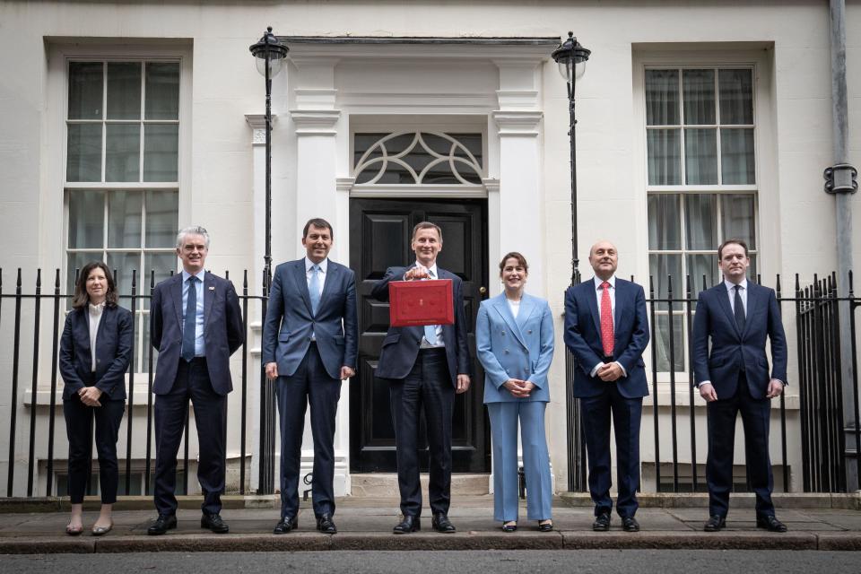 Chancellor of the Exchequer Jeremy Hunt leaves 11 Downing Street, London, with his ministerial box and members of his ministerial team, (left to right) Baroness Joanna Penn, James Cartlidge, John Glen, Victoria Atkins, Andrew Griffith and Gareth Davies, before delivering his Budget at the Houses of Parliament. Picture date: Wednesday March 15, 2023. See PA story POLITICS Budget. Photo credit should read: Stefan Rousseau/PA Wire