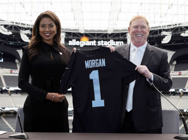 PHOTO: Sandra Douglass Morgan and owner and managing general partner Mark Davis of the Las Vegas Raiders pose with a jersey after a news conference introducing Morgan as the new President of the Raiders at Allegiant Stadium on July 7, 2022, in Las Vegas. (Ethan Miller/Getty Images)