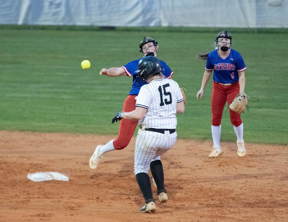 Shortstop Tatum Hasting (7) steps on second and then fires to first for a double play during the South Warren vs Pace softball game at Pace High School on Wednesday, April 5, 2023.