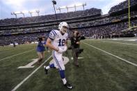 Indianapolis Colts quarterback Andrew Luck jogs off the field after an NFL wild card playoff football game against the Baltimore Ravens Sunday, Jan. 6, 2013, in Baltimore. The Ravens won 24-9. (AP Photo/Gail Burton)