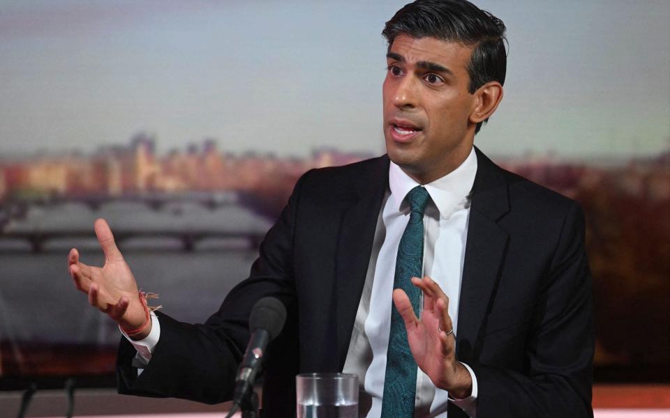 Rishi Sunak said: 'Our emphasis should be on making sure that everyone gets their booster jab' - Jeff Overs/BBC/AFP via Getty Images