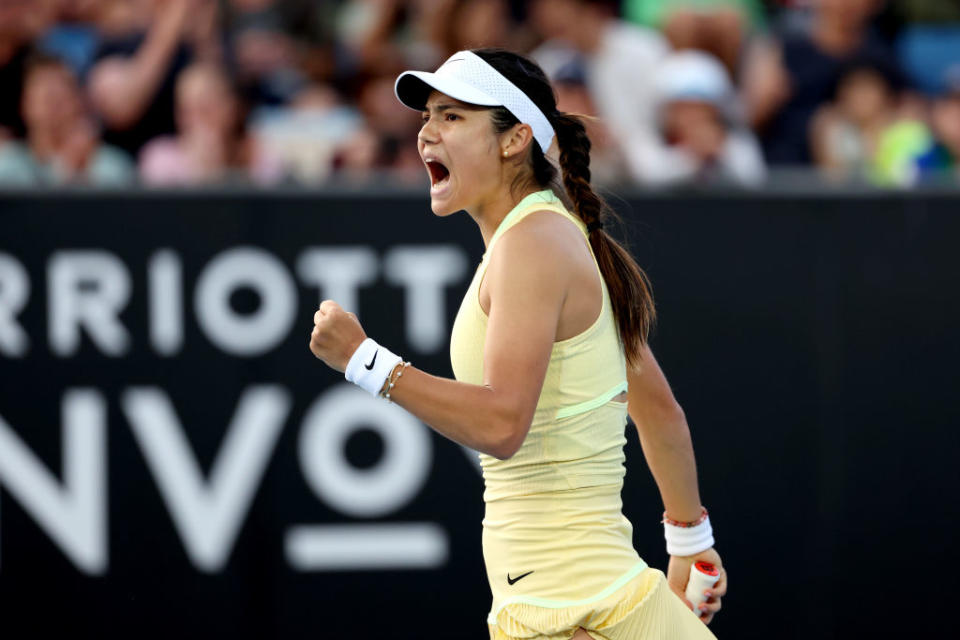 MELBOURNE, AUSTRALIA - JANUARY 16: Emma Raducanu of Great Britain celebrates winning set point in their first round match against Shelby Rogers of the United States during the 2024 Australian Open at Melbourne Park on January 16, 2024 in Melbourne, Australia. (Photo by Julian Finney/Getty Images)