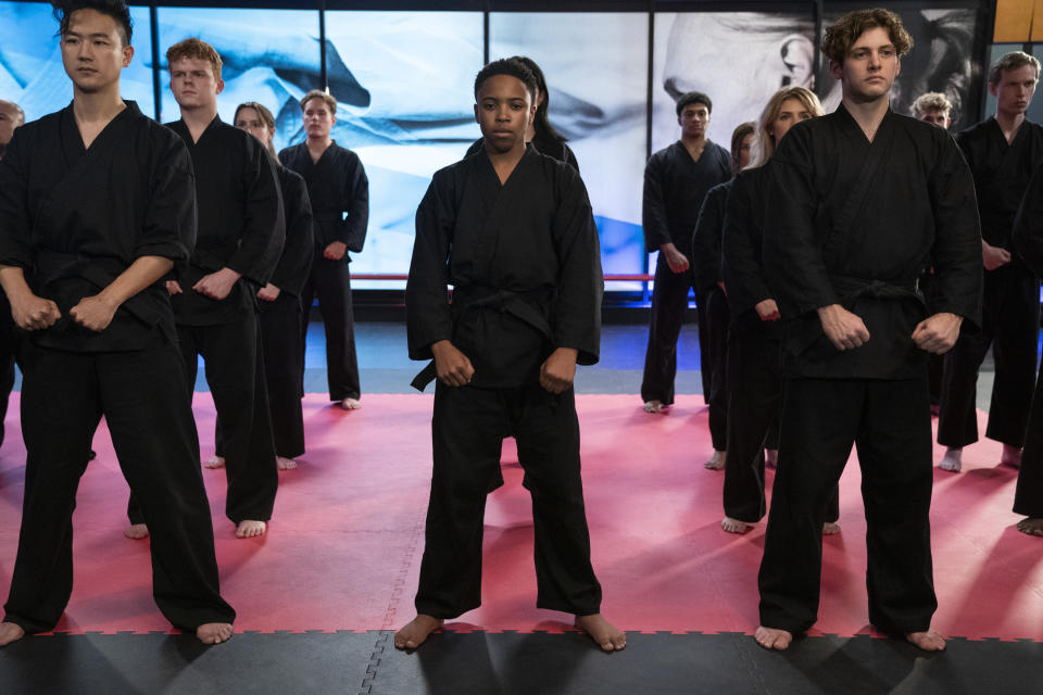 Cobra Kai. (L to R) Joe Seo as Kyler, Dallas Dupree Young as Kenny in Cobra Kai. Cr. Curtis Bonds Baker/Netflix © 2022