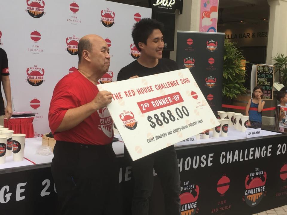 Zermatt Neo, 28, managed to eat 45 Chilli Crab Baos to come in third. He walked away with $888 cash and a $200 Red House Seafood dining voucher. (Photo: Yahoo Singapore)