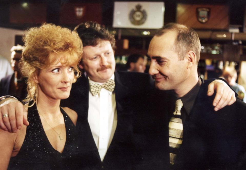 EMBARGOED: NOT FOR PUBLICATION BEFORE 0001hrs SATURDAY, FEBRUARY 24.  Liz (Beverley Callard) senses danger when she and Jim (Charles Lawson) meet up with Johnny Johnson (Robert Gwilym) at the army reunion.