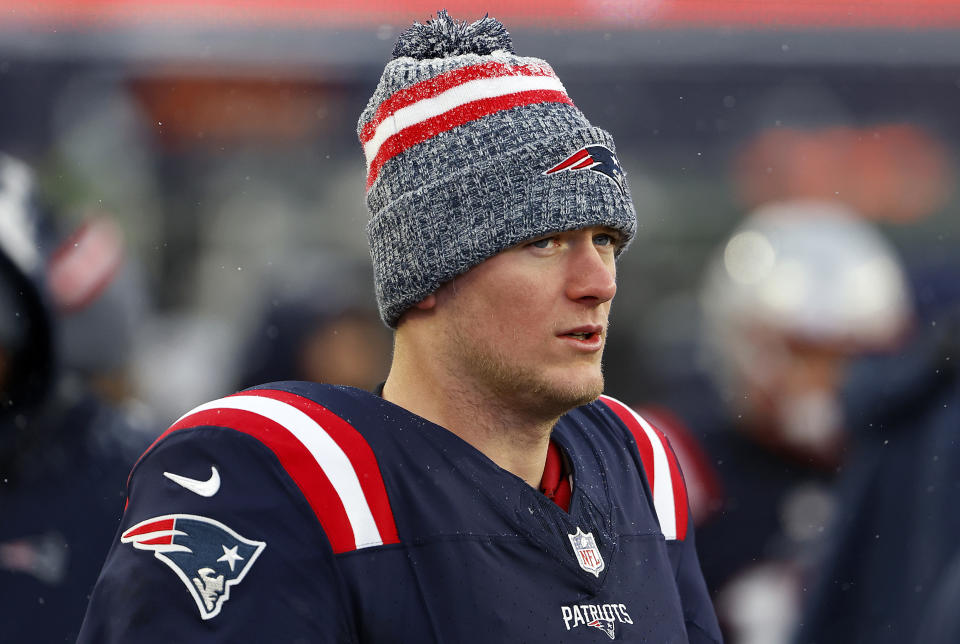 FOXBORO, MA - JANUARY 7: Mac Jones No. 10 of the New England Patriots watches after a game against the New York Jets at Gillette Stadium on January 7, 2024 in Foxborough, Massachusetts.  (Photo by Winslow Townson/Getty Images)