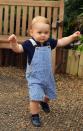 <p>Like these railroad stripe overalls with a navy polo. [Photo: Rex] </p>