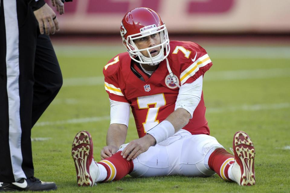 Kansas City Chiefs quarterback Matt Cassel (7) adjusts his sox after getting knocked to the ground during the second half of an NFL football game against the Oakland Raiders at Arrowhead Stadium in Kansas City, Mo., Sunday, Oct. 28, 2012. (AP Photo/Reed Hoffmann)