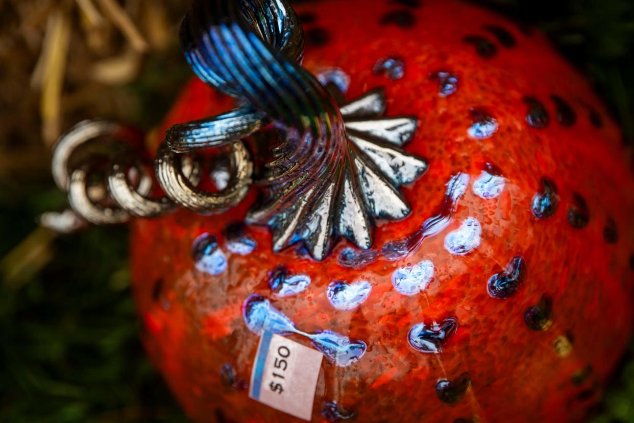 An intricately designed during the 14th Annual Great Glass Pumpkin Patch on the Monroe County courthouse lawn on Saturday, Oct. 14, 2023. The sale benefits the Bloomington Creative Glass Center.