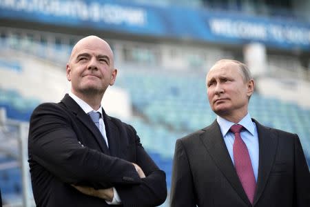 Russian President Vladimir Putin (R) and FIFA President Gianni Infantino visit the Fisht Stadium, which will host matches of the 2018 FIFA World Cup in Sochi, Russia May 3, 2018. Sputnik/Aleksey Nikolskyi/Kremlin via REUTERS