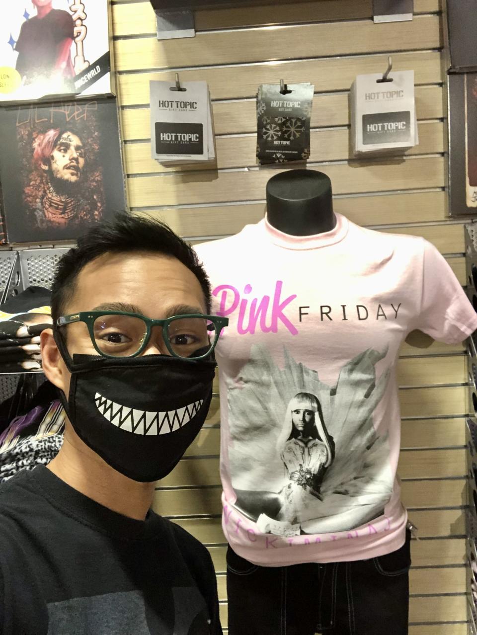 Author posing with a Nicki Minaj "Pink Friday" shirt