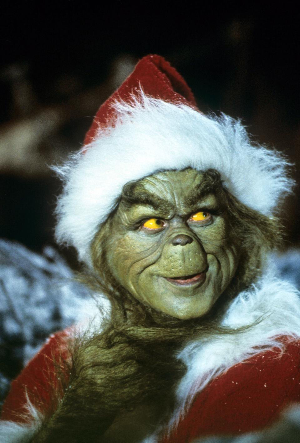 Jim Carrey as The Grinch