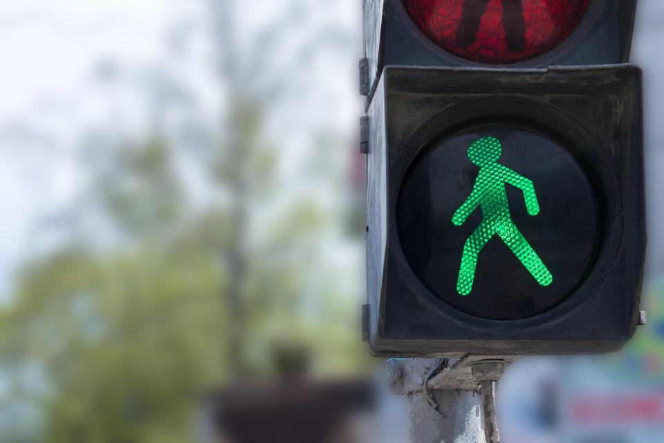 The ‘ticking’ noise that plays with the walk signal at traffic lights is one example of how sonification can assist blind and visually impaired people. Shutterstock