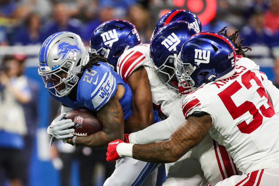 Detroit Lions running back Jahmyr Gibbs (26) runs against New York Giants during the first half of a preseason game at Ford Field in Detroit on Friday, Aug. 11, 2023.