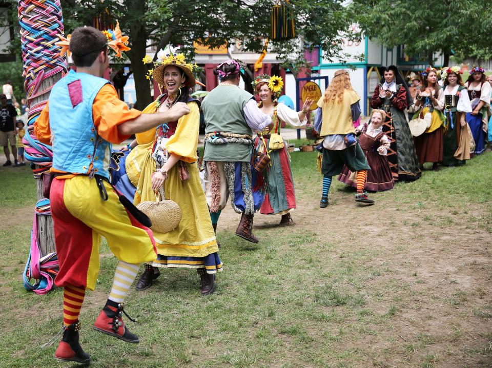Costumed performers dance a Dargasen, on July 7, 2013, an English country dance in the towne square. The Renaissance Faire features a variety of 16th century arts, games, food, music, comedy and dance.