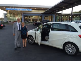 Kim Price, first buyer of 2014 Mercedes-Benz B-Class Electric Drive, and sales associate Steven Hall