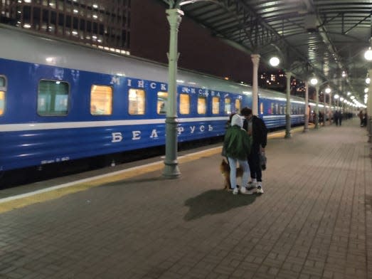 A photo shows a train leaving Russia after passengers have boarded.