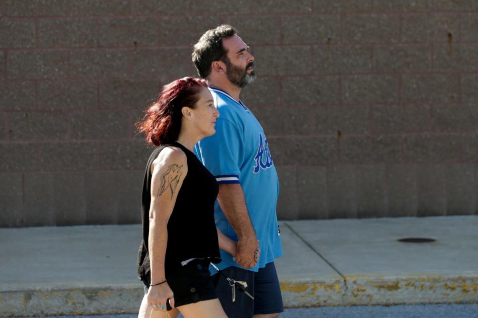 Michael Barnett walks after being released from the custody of the Tippecanoe County Sheriff's office, Wednesday, Sept. 18, 2019 in Lafayette. The Tippecanoe criminal magistrate issued warrants for Barnett's arrest on Tuesday on charges of abandoning their adoptive daughter in Lafayette in 2013. A warrant is still outstanding for Barnett's ex-wife, Kristine Barnett.