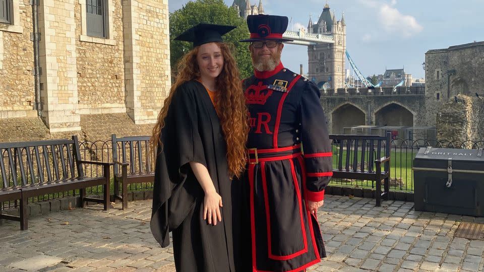 Here's Clawson pictured on her college graduation day with her Yeoman Warder dad. - Courtesy Megan Clawson