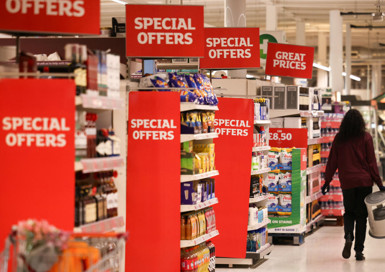 A employee walks inside a Sainsbury’s supermarket in Richmond, west London, Britain, June 27, 2022. Picture taken June 27, 2022. REUTERS/Henry Nicholls