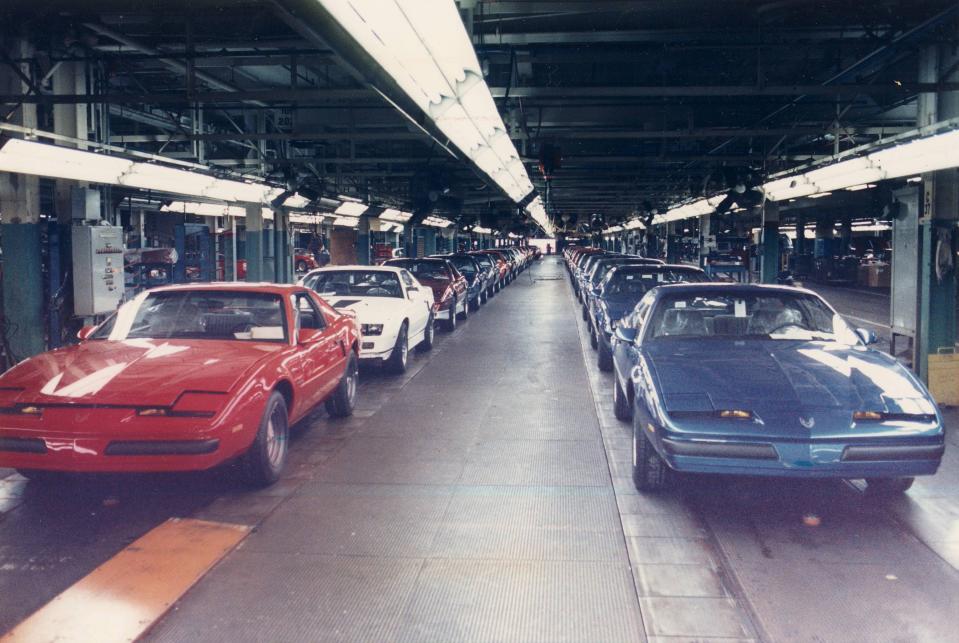 Completed cars fresh from the assembly line appear in the GM plant in Norwood days before the plant was closed in 1987.