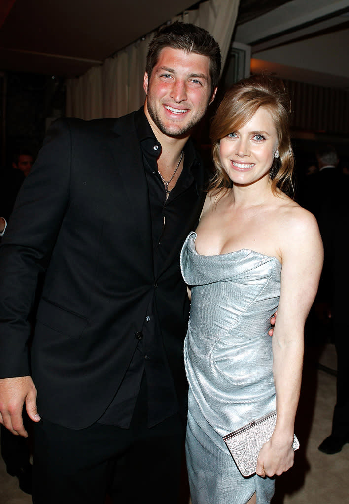 Amy Adams looked terrified of Tim Tebow ... and he looked either sunburned, embarrassed, or sauced.