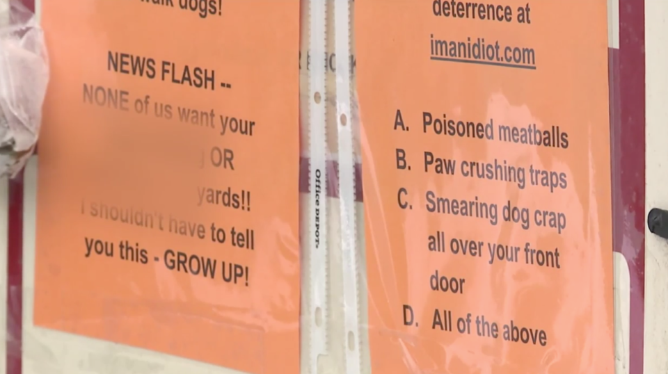 A sign posted in Denver, Colorado, threatens dog owners with “poisoned meatballs” and “paw crushing traps” if they don’t pick up their pet’s poop from the owner’s lawn. (Photo: WTVR)