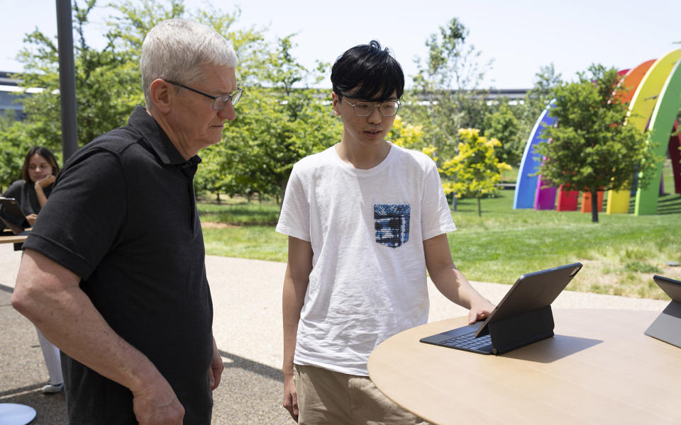 Apple CEO Tim Cook meets with student developers at Apple Park in advance of WWDC2023.    