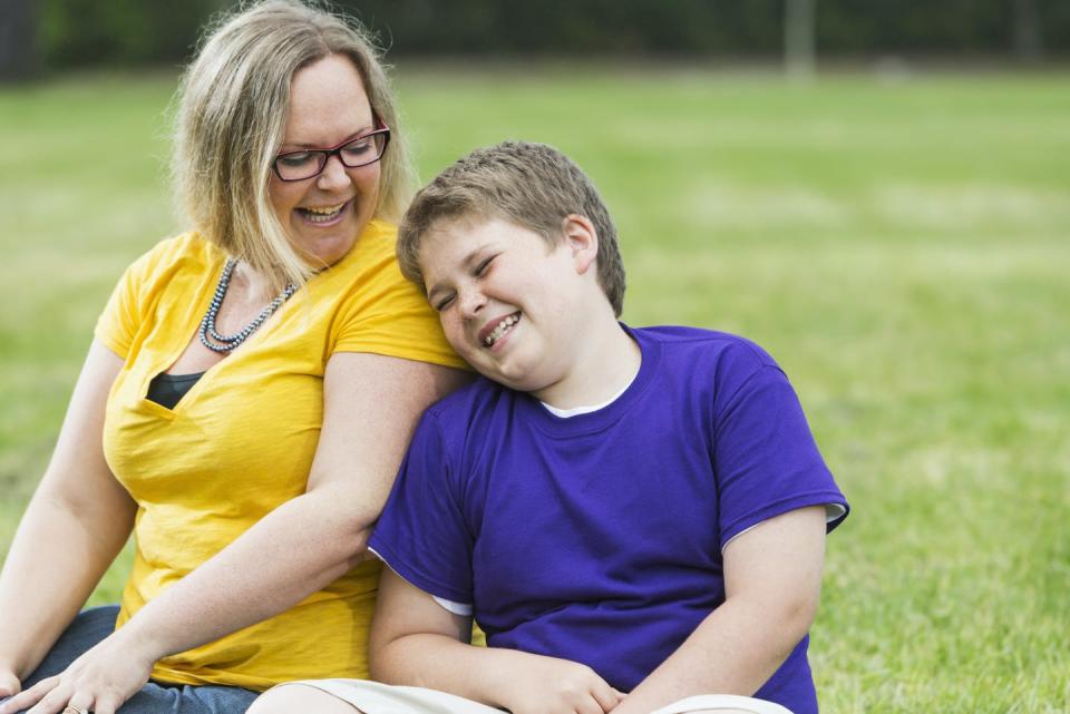 <span class="caption">Obesity intervention programs tend to focus on healthy food and physical activity. But is that enough?</span> <span class="attribution"><a class="link " href="https://www.gettyimages.com/detail/photo/mother-and-son-laughing-in-the-park-royalty-free-image/487374270" rel="nofollow noopener" target="_blank" data-ylk="slk:kali9/E+ Collection via Getty Images;elm:context_link;itc:0;sec:content-canvas"> kali9/E+ Collection via Getty Images</a></span>
