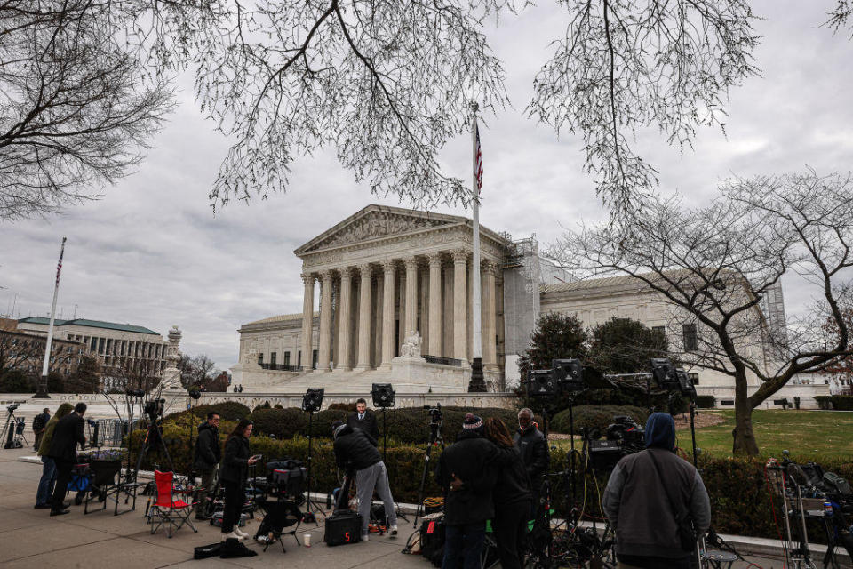 Members of the media outside the Supreme Court in Washington, D.C., on Monday, March 4, 2024. / Credit: Valerie Plesch/Bloomberg via Getty Images