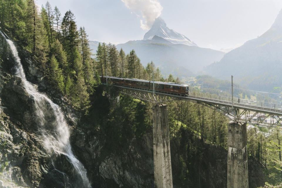 scenic view of train on the background of matterhorn mountain