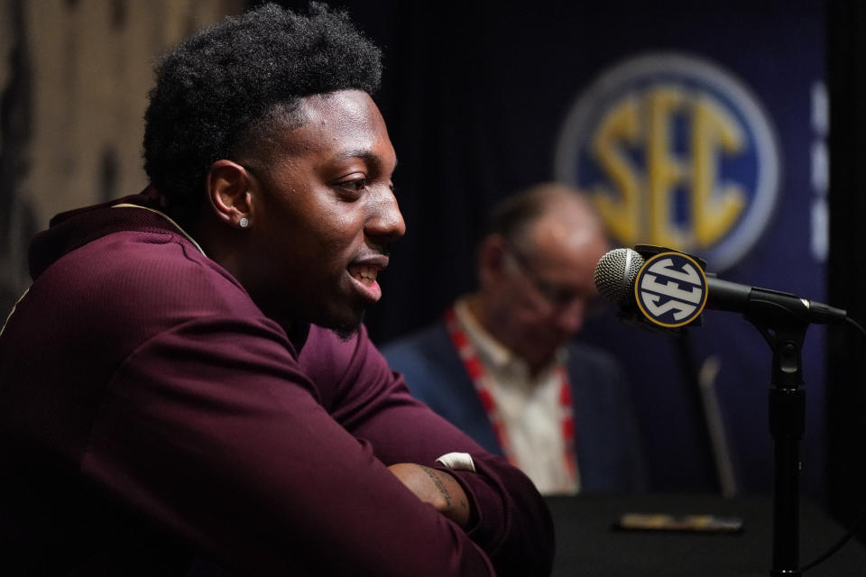 Texas A&M NCAA college basketball player Wade Taylor IV speaks during Southeastern Conference Media Days, Wednesday, Oct. 18, 2023, in Birmingham, Ala. (AP Photo/Mike Stewart)