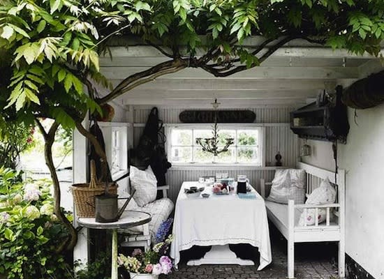 <body> <p>You could use your lean-to shed to store rusty old tools—or you could outfit it with vintage furnishings, pretty tablecloths, lots of <a rel="nofollow noopener" href=" http://www.bobvila.com/slideshow/7-things-you-need-to-know-before-painting-your-walls-white-48979?bv=yahoo" target="_blank" data-ylk="slk:white paint;elm:context_link;itc:0;sec:content-canvas" class="link ">white paint</a>, and a chandelier and turn it into a cottage chic dining nook instead. Storage shelves hold supplies for impromptu snacks alfresco.</p> <p><strong>Related: <a rel="nofollow noopener" href=" http://www.bobvila.com/slideshow/eating-out-10-essentials-for-alfresco-dining-47656?bv=yahoo" target="_blank" data-ylk="slk:Eating Out—10 Essentials for Alfresco Dining;elm:context_link;itc:0;sec:content-canvas" class="link ">Eating Out—10 Essentials for Alfresco Dining</a> </strong> </p> </body>