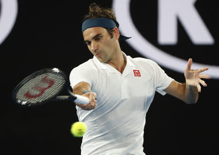 Tennis - Australian Open - Third Round - Melbourne Park, Melbourne, Australia, January 18, 2019. Switzerland's Roger Federer in action during the match against Taylor Fritz of the U.S. REUTERS/Aly Song
