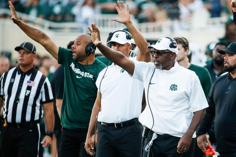 Michigan State interim head coach Harlon Barnett, right, reacts to a play against Maryland during the second half of MSU's 31-9 loss on Saturday, Sept. 23, 2023, in East Lansing.