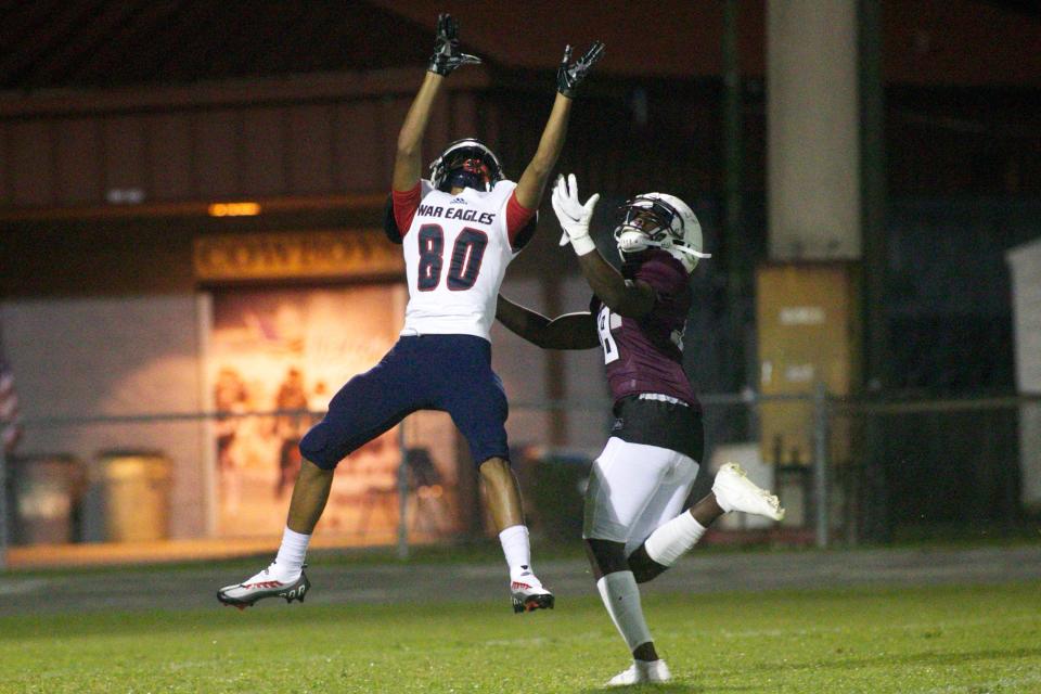 A Wakulla player attempts to catch the ball in a game against Madison County on Aug. 20, 2022, at Boot Hill. The Cowboys won, 25-14.