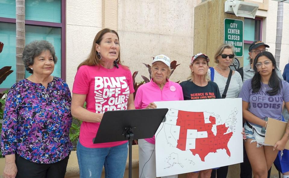 In this photo from December 2023, Laura Goodhue, executive director of the Florida Alliance of Planned Parenthood Affiliates, speaks at a press conference to boost the petition drive to allow access to legal abortion in Florida.