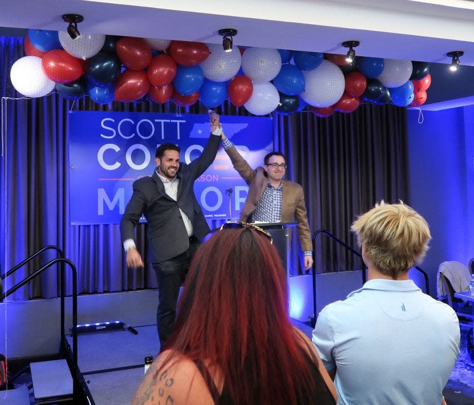 Mayor Scott Conger and campaign manager, Alex Reed, celebrate victory as hundreds of supporters of Scott Conger for Mayor of the City of Jackson gathered at the Doubletree Hotel in Jackson, Tennessee for an election watch party on June 13, 2023. Everyone watched anxiously for over an hour as the election returns were given by Steve Bowers and Steve Beverly on EPlus TV over large screens in the room. The Madison County Election Commission announced the final results showing the incumbent Scott Conger, receiving 5,304 (58%) votes to 3,813 (42%) for challenger Ray Condray.