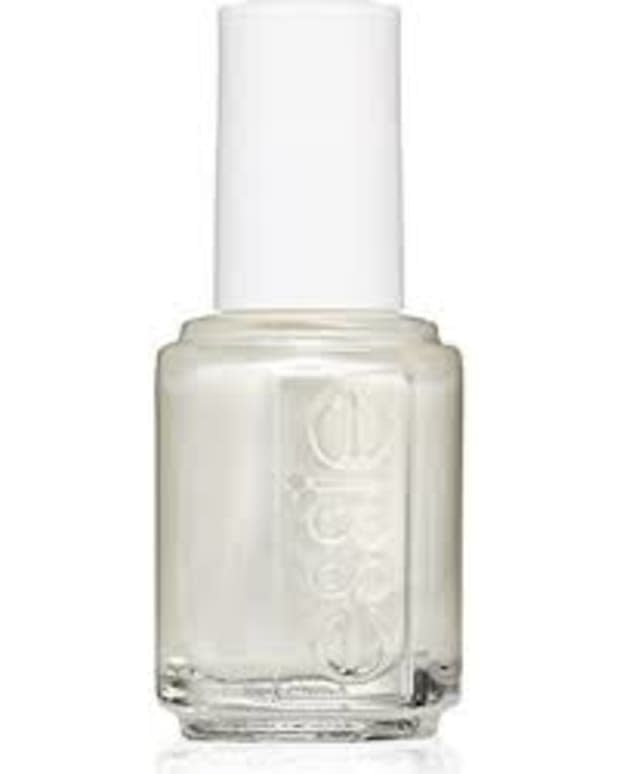 <p>Essie Nail Polish in Pearly White, $10, <a href="https://shop-links.co/1687122675063670952" rel="nofollow noopener" target="_blank" data-ylk="slk:available here;elm:context_link;itc:0;sec:content-canvas" class="link ">available here</a>.</p>