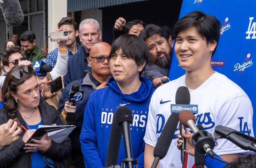 Los Angeles, CA - February 03: Dodger Shohei Ohtani talks with media at DodgerFest 2024, the official kickoff celebration for the upcoming season of Dodger baseball at Dodger Stadium on Saturday, Feb. 3, 2024 in Los Angeles, CA. (Brian van der Brug / Los Angeles Times)