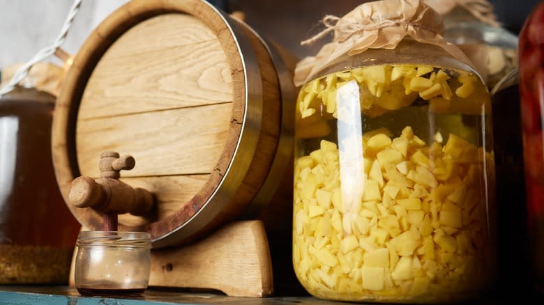 Barrel and jar of whiskey