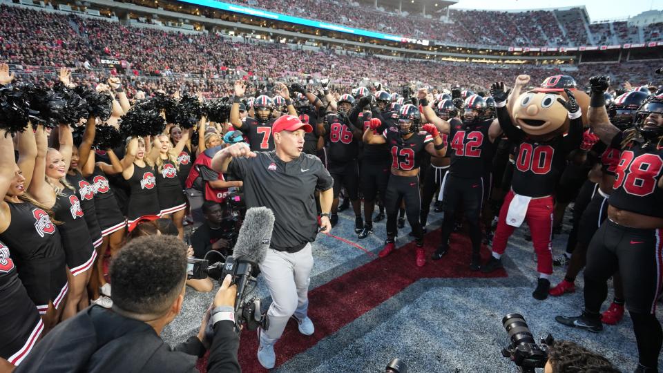 Sep 24, 2022; Columbus, Ohio, USA; Ohio State Buckeyes strength coach Mickey Marotti leads the team in the "Quick Cals" exercise before the NCAA Division I football game between the Ohio State Buckeyes and the Wisconsin Badgers at Ohio Stadium. Mandatory Credit: Doral Chenoweth/The Columbus Dispatch