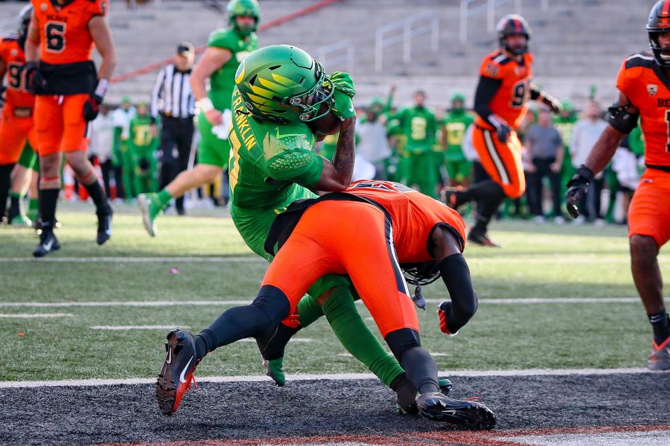 Oregon wide receiver Troy Franklin carries the ball into the end zone for a touchdown as the No. 9 Oregon Ducks take on the No. 21 Oregon State Beavers at Reser Stadium in Corvallis, Ore. Saturday, Nov. 26, 2022.